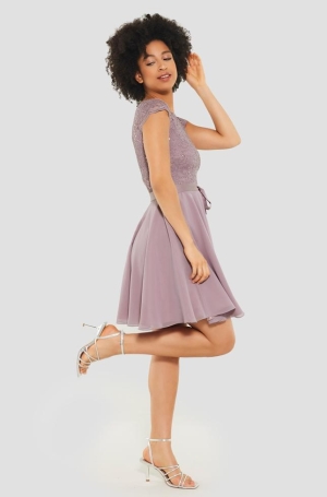 Swing női ruha derékban szabott,alúl muszlin,felül flitteres csipkés