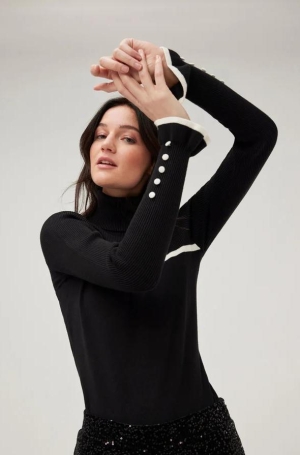 Leo & Ugo női pulóver, garbó, elöl masnis, fodros-gombos ujjú